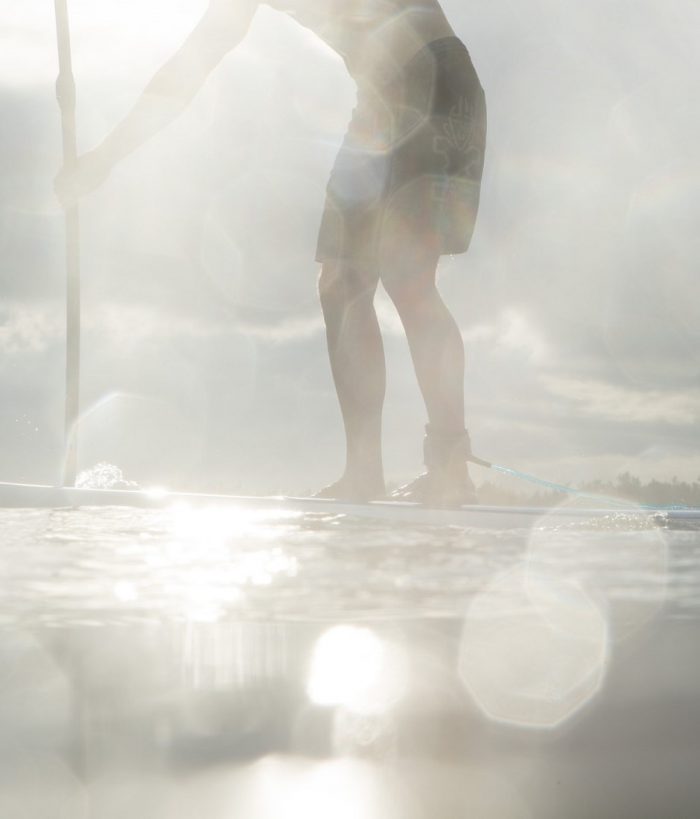 Stand up paddle shop man paddling water droplets 940x1100